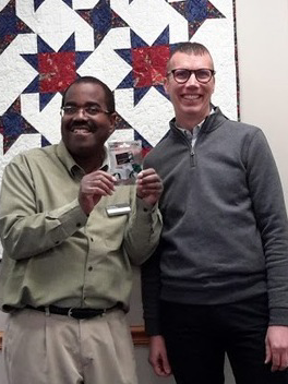 Eric Staton receiving award from CADL's Executive Director.png