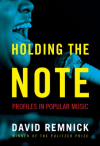 holding the note